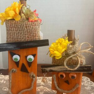 homemade-wood-pumpkins-chair-spindle-hat-charms-and-googly-eyes